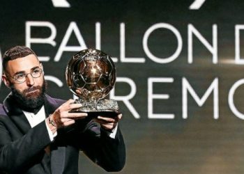 Real Madrid's French forward Karim Benzema receives the Ballon d'Or award during the 2022 Ballon d'Or France Football award ceremony at the Theatre du Chatelet in Paris on October 17, 2022. (Photo by FRANCK FIFE / AFP)