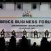 (From L to R) Wang Tongzhou, Chairman of China's Communications Construction Company, Onkar Kanwar, Chairman of BRICS Business Council of the India Chapter and Chairman of Apollo Tyres, Mikhail Makarov, Chair Deregulation WG and director of the Agency of Strategic Initiative Office of International Relations, Angelo Oselame, head of Middle East and Africa of Marcopolo, Stavros Nicolaou, BRICS Business Council of the SA Chapter, Wamkele Mene, secretary-general of the African Continental Free Trade Area (AfCFTA), and Gugulethu Mfuphi, Award-winning Financial Journalist, attend the 2023 BRICS Bisieness Forum at the Sandton Convention Centre in Johannesburg on August 22, 2023. (Photo by GIANLUIGI GUERCIA / AFP)