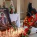 Mourners place candles in a room of Radio Amplitude FM where a portrait of journalist Martinez Zogo has been placed to pay tribute to him, in the Elig Essono district in Yaounde on January 23, 2023. A popular Cameroon radio journalist who had been missing following what a media rights group called an abduction has been found dead, his employer and police said on January 22, 2023.
Martinez Zogo was managing director of Yaounde-based private radio station Amplitude FM and the star host of a popular daily programme, Embouteillage (Gridlock).
On the air, the 51-year-old regularly tackled cases of corruption, not hesitating to question important personalities by name. (Photo by Daniel Beloumou Olomo / AFP)