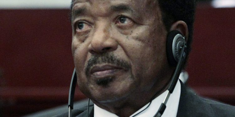 FILE-In this Thursday, June 30, 2011, file photo Cameroon President Paul Biya listens during a session on the 17th African Union Summit theme of youth empowerment, at the Sipopo Conference Center, outside Malabo, Equatorial Guinea. Cameroon's 79-year-old President Paul Biya marks 30-years in office on Tuesday, Nov. 6, 2012, and the ruling party planned boisterous celebrations while banning the opposition from holding a protest.(AP Photo/Rebecca Blackwell, File)