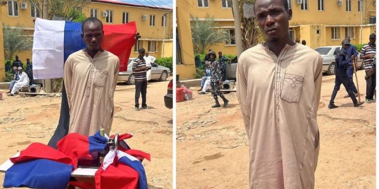 Nigerian tailor arrested for sewing Russian flag