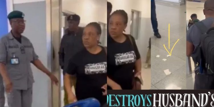 woman tears husband's passport