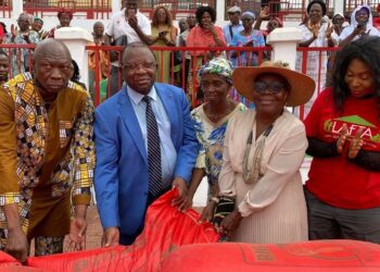 Trade Minister Luc Magloire Mbarga Atangana with Big Joe Rice