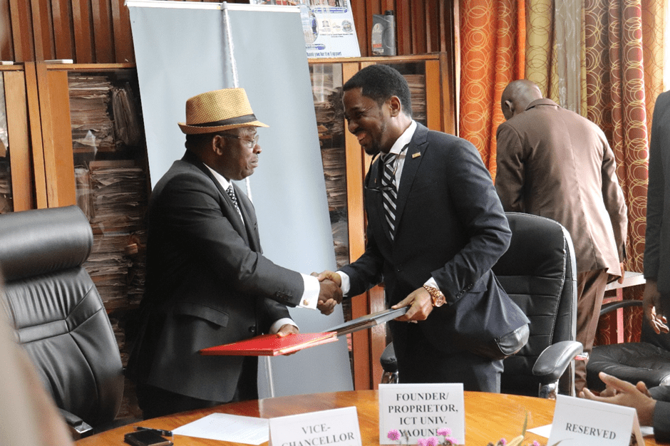 L-R: UB Vice Chancellor, Prof Horace Ngomo Manga & ICT University Founder, Prof Victor Mbarika, shaking hands after signing agreement