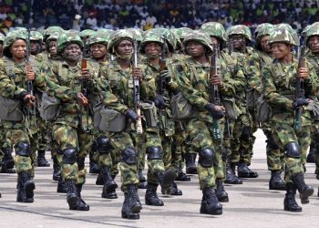 Nigerian soldiers march during 58th anniversary celebrations of Nigerian independence, in Abuja, Nigeria, Monday, Oct. 1, 2018. (AP Photo/Olamikan Gbemiga)