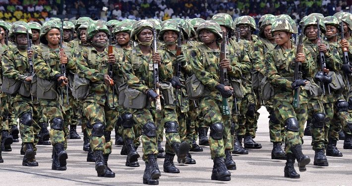 Nigerian soldiers march during 58th anniversary celebrations of Nigerian independence, in Abuja, Nigeria, Monday, Oct. 1, 2018. (AP Photo/Olamikan Gbemiga)
