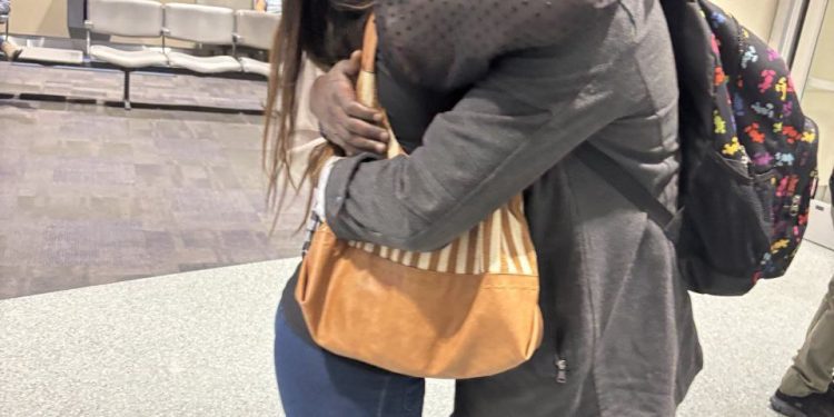 US citizen Derogy Ndewa reunites with wife in the USA