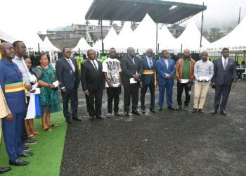 Cocoa Farmers receive money in Buea