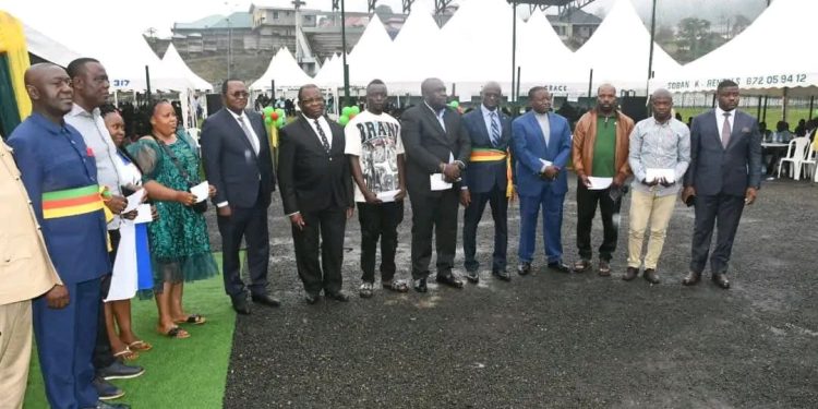 Cocoa Farmers receive money in Buea