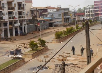 Soldiers clear a road in Bamenda, Cameroon, December 8, 2016. REUTERS/Stringer