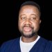 U.S.-based Cameroonian nurse educator, researcher and healthcare policy advocate, John Nyah Mbout,