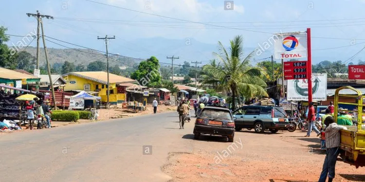 Main Street Of Ndop A Small Town In Cameroon With A Total Petrol Station F0JN69