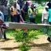 SENSITIVE MATERIAL. THIS IMAGE MAY OFFEND OR DISTURB Body of a victim is carried following a shooting at a Kumba school, Cameroon