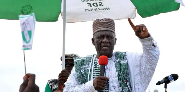 Cameroonian opponent John Fru Ndi speaks during an electoral meeting in Yaounde on October 8, 2011 on the eve of the presidential elections. Charismatic and authoritarian, John Fru Ndi is widely held to be the only opposition leader with an outside chance of ousting Cameroon's President Paul Biya during Sunday's presidential election. More than seven million of the 19.4 million Cameroonians will be asked to choose on Sunday from among 23 candidates in a single round, after a low-key campaign and amid relative indifference. 
AFP PHOTO / SEYLLOU / AFP PHOTO / SEYLLOU