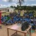 A teacher conduct her class under an improvised shelter in the Northern Province of Cameroon on September 16, 2016. (Photo by REINNIER KAZE / AFP)