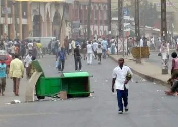 A picture taken on February 25, 2008 in the Akwa district of Douala, after residents had begun raiding shops owned by Chinese traders. Two people were shot dead and at least one was seriously injured in Cameroon's economic capital Douala today when a road transporters' strike led to clashes with police, witnesses said. One witness said that two men were shot in the Bessengue district of the port city, and a Cameroonian journalist confirmed to AFP that the bodies were taken to the mortuary of Douala's Laquentinie Hospital.  The strikers were protesting at a rise in fuel prices and those of several basic products, but Douala is also a stronghold of the opposition to President Paul Biya, who has been in power since 1982.