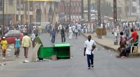 A picture taken on February 25, 2008 in the Akwa district of Douala, after residents had begun raiding shops owned by Chinese traders. Two people were shot dead and at least one was seriously injured in Cameroon's economic capital Douala today when a road transporters' strike led to clashes with police, witnesses said. One witness said that two men were shot in the Bessengue district of the port city, and a Cameroonian journalist confirmed to AFP that the bodies were taken to the mortuary of Douala's Laquentinie Hospital.  The strikers were protesting at a rise in fuel prices and those of several basic products, but Douala is also a stronghold of the opposition to President Paul Biya, who has been in power since 1982.