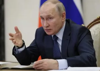Russian President Vladimir Putin gestures while speaking during the annual meeting of the Presidential Council for Civil Society and Human Rights via videoconference in Moscow, Russia, Wednesday, Dec. 7, 2022. (Mikhail Metzel, Sputnik, Kremlin Pool Photo via AP)