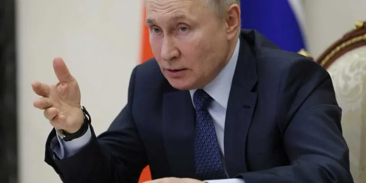 Russian President Vladimir Putin gestures while speaking during the annual meeting of the Presidential Council for Civil Society and Human Rights via videoconference in Moscow, Russia, Wednesday, Dec. 7, 2022. (Mikhail Metzel, Sputnik, Kremlin Pool Photo via AP)
