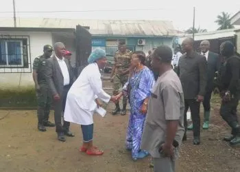 Secondary Education Minister Nalova Lyonga donates 10 MFCFA to Limbe flood victims.
