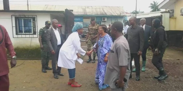 Secondary Education Minister Nalova Lyonga donates 10 MFCFA to Limbe flood victims.