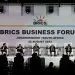 (From L to R) Wang Tongzhou, Chairman of China's Communications Construction Company, Onkar Kanwar, Chairman of BRICS Business Council of the India Chapter and Chairman of Apollo Tyres, Mikhail Makarov, Chair Deregulation WG and director of the Agency of Strategic Initiative Office of International Relations, Angelo Oselame, head of Middle East and Africa of Marcopolo, Stavros Nicolaou, BRICS Business Council of the SA Chapter, Wamkele Mene, secretary-general of the African Continental Free Trade Area (AfCFTA), and Gugulethu Mfuphi, Award-winning Financial Journalist, attend the 2023 BRICS Bisieness Forum at the Sandton Convention Centre in Johannesburg on August 22, 2023. (Photo by GIANLUIGI GUERCIA / AFP)