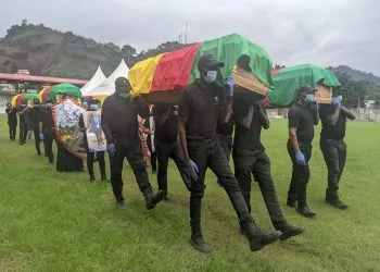 Killers of slain delegates will face punishment, authorities declare at public funeral