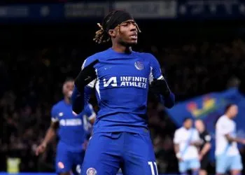 Madueke celebrates his winning penalty against Palace