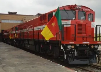 Sand truck collides with train, injuring two