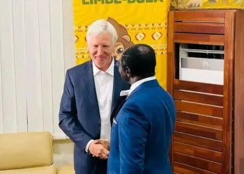 Indomitable Lions coach March Brys with the Minister of sports