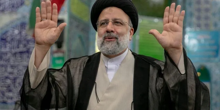 TEHRAN, IRAN - JUNE 18:  Ebrahim Raisi, a candidate in Iran's presidential elections waves to the media after casting his vote at a polling station on June 18, 2021, on the day of the Islamic republic's presidential election.  The country's incumbent president, Hassan Rouhani, is ineligible to run again after serving two terms in office. (Photo by Majid Saeedi/Getty Images)