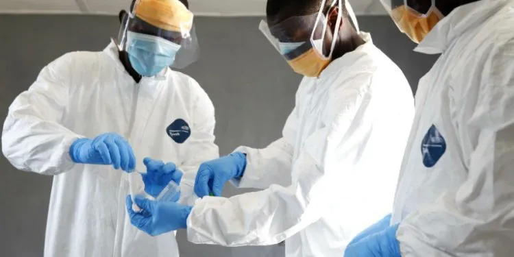 Taking A Sample Swab In Kakata Liberia