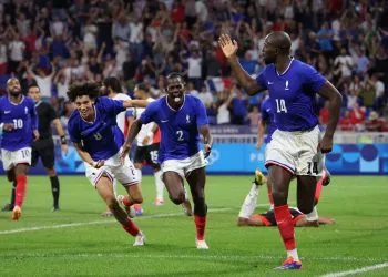 Paris 2024 Olympics - Football - Men's Semi-final - France vs Egypt - Lyon Stadium, Decines-Charpieu, France - August 05, 2024. Jean-Philippe Mateta of France celebrates scoring their second goal with teammates. REUTERS/Nir Elias