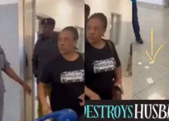 woman tears husband's passport
