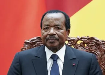 FILE - March 22, 2018 file photo, Cameroon President Paul Biya is seated with Chinese President Xi Jinping as they attend a signing ceremony at the Great Hall Of The People in Beijing. Cameroon's president, one of Africa's longest-serving leaders, says on Friday, July 13, 2018 he will run again in October's election. The 85-year-old president has been in power since 1982. He oversees an increasingly restive Central African nation that faces an Anglophone separatist movement and the threat from Boko Haram extremists crossing the border from Nigeria. (Lintao Zhang/Pool Photo via AP, File)