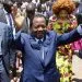 FILE - In this Sunday Oct 9, 2011 file photo, Cameroon President Paul Biya waves after casting his vote during the presidential elections in Yaounde, Cameroon. A bloody conflict between Cameroon's government and Anglophone separatists over language is now threatening next month's presidential election. The 85-year-old President Paul Biya, one of Africa's longest-serving leaders, vows to hold the largely Francophone country together even as thousands flee violence in English-speaking regions. (AP Photo/Sunday Alamba, File)