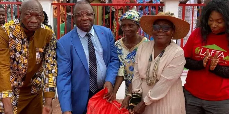 Trade Minister Luc Magloire Mbarga Atangana with Big Joe Rice