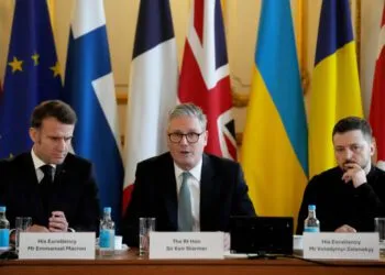 French President Emmanuel Macron, British Prime Minister Keir Starmer and Ukraine’s President Volodymyr Zelenskyy attend a meeting of leaders during a summit on Ukraine at Lancaster House in London, Britain, March 2, 2025. Christophe Ena/Pool via REUTERS