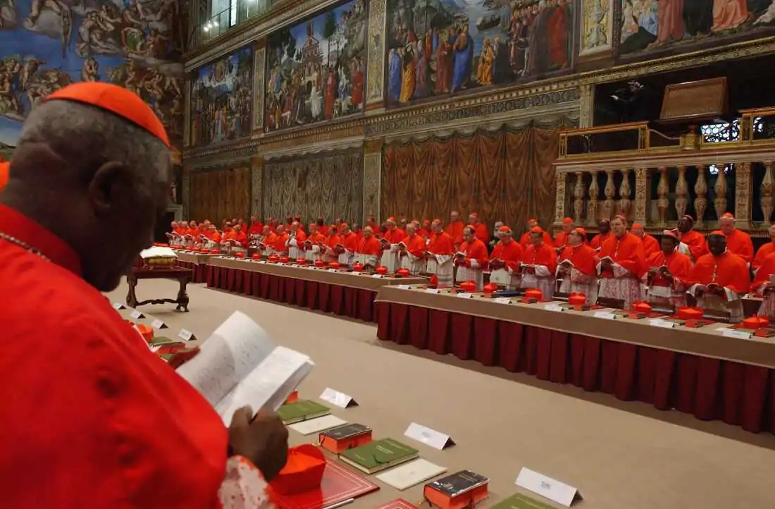 VATICAN CITY - APRIL 18: Cardinals of the Catholic Church attend the election conclave in the Sistine Chapel on April 18, 2005 at the Vatican, Vatican City. The 115 Cardinals will elect a successor to Pope John Paul II during the Conclave in the Chapel, at which point symbolic white smoke rising from the chimney will announce to the world that they have reached a decision. (Photo by Arturo Mari - Vatican Pool/ Getty Images)