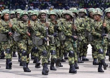 Nigerian soldiers march during 58th anniversary celebrations of Nigerian independence, in Abuja, Nigeria, Monday, Oct. 1, 2018. (AP Photo/Olamikan Gbemiga)
