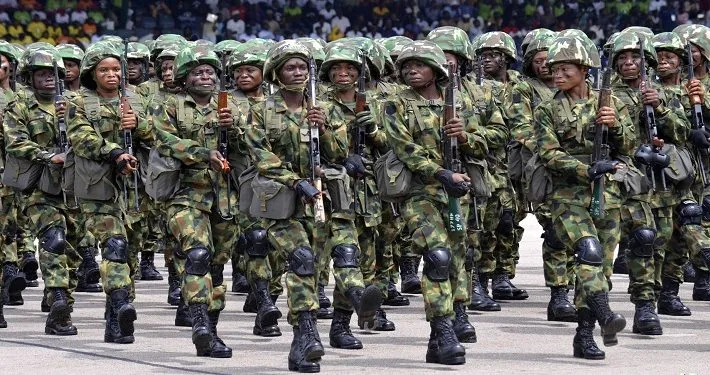 Nigerian soldiers march during 58th anniversary celebrations of Nigerian independence, in Abuja, Nigeria, Monday, Oct. 1, 2018. (AP Photo/Olamikan Gbemiga)