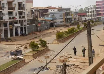 Soldiers clear a road in Bamenda, Cameroon, December 8, 2016. REUTERS/Stringer